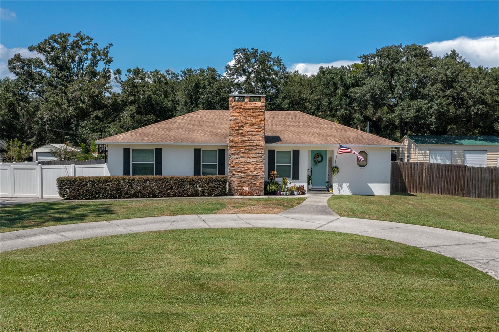 Country Living in Sugar Creek – No HOA. This beautifully updated 3-bedroom, 2-bath split-bedroom home sits on a spacious 0.51-acre lot and offers over 1,700 sq. ft. of heated living space plus a 2-car garage, and newly built shop and circular driveway. Perfectly situated near the Polk Parkway, it provides easy access to both Winter Haven and Lakeland. The exterior has been freshly painted, giving the home a modern, welcoming look. Step inside to a sunken living room that flows seamlessly into the kitchen and dining areas, creating the perfect space for entertaining. The kitchen features granite countertops and all-new KitchenAid appliances, while the dining area includes a built-in buffet and opens to a large bonus room, ideal for a second living space or game room. The primary suite boasts dual walk-in closets with built-ins and a relaxing master bath with a Bluetooth “smart” light switch and nightlight options. Two additional spacious bedrooms share a centrally located bathroom. Car enthusiasts will love the newly built 24x40 garage with electricity and a thickened slab (11'–14') ready for a future car lift, plus a 30-amp RV plug. Outdoors, the expansive yard offers endless opportunities for gatherings, play, or even a garden. Additional updates include- New septic drain field (2017), Double-pane insulated windows (2017). Irrigation is on private well. Located just minutes from the Circle B Bar Reserve with scenic walking trails, this home is perfect for those who love both indoor comfort and outdoor adventure. Call today for your private showing.