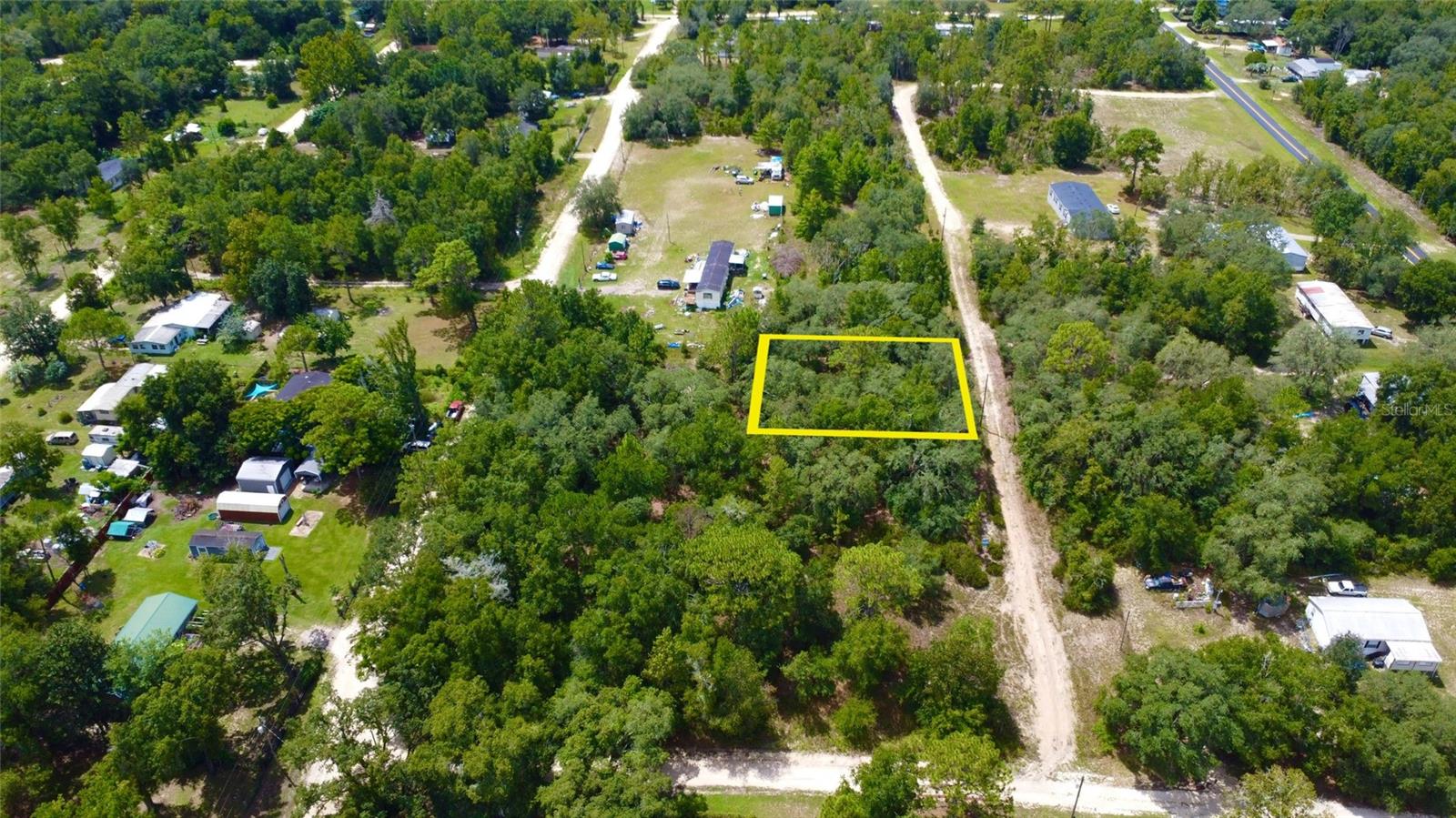 Great land opportunity for modular home or perfect place to build your dream home with country living and land privacy, great price and right off U.S. highway 27. Enough room for trailer, boat, 4-wheelers and more. 105'X108' (WXL) lot on side of a hill on a private street, free from flood zone & and no wetland, HOA & CDD free. Lot measurer 0.26 acre (+/- ) & addition 4 adjacent lots for sale separately. Minutes to Bronson and Downtown Williston 10 minute drive to town; grocery, shops and restaurants, in-between US-HWY 27 and NE 60th street.
Great local actives to visit: Horse Riding at Canopy Oak Trails or Williston Horseman's Park, Adventure into Cedar Lakes Woods and Gardens, or Dive into Devil's Den Pre-Historic Spring and Diving Training
GPS Coordinates: 29.417043, -82.542712
Contact the Levy County land development/zoning and planning to discuss building specifications and confirm and use.
