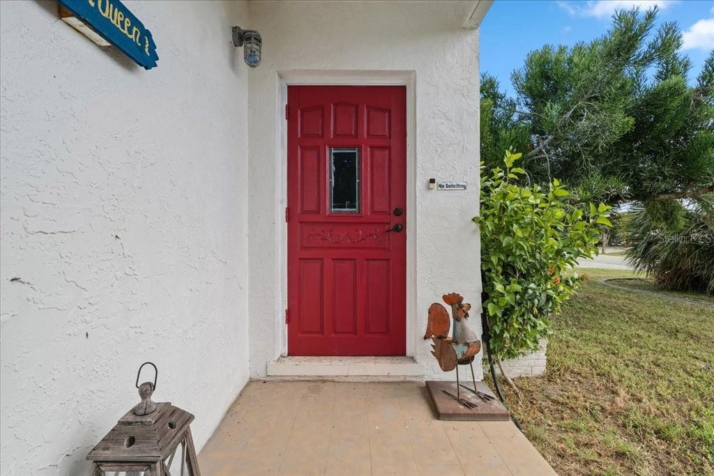 Photo of 124 Leland St SE, Port Charlotte, FL 33952 (MLS # C7515944)