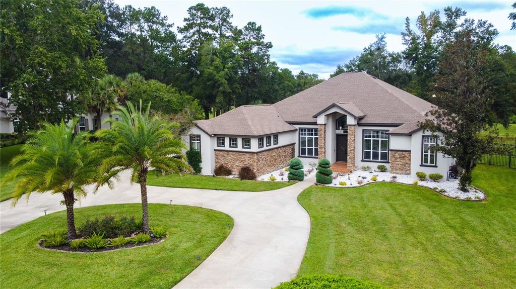 Photo of 617 SE 47th Loop, Ocala, FL 34480 (MLS # OM708037)