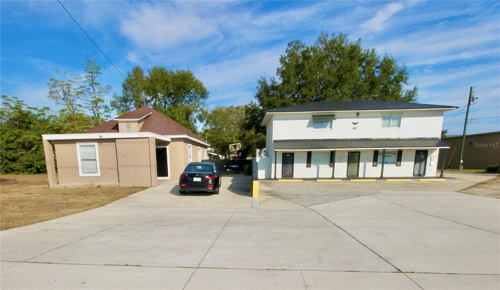 Photo of 608 Dundee Rd, Dundee, FL 33838 (MLS # P4937571)