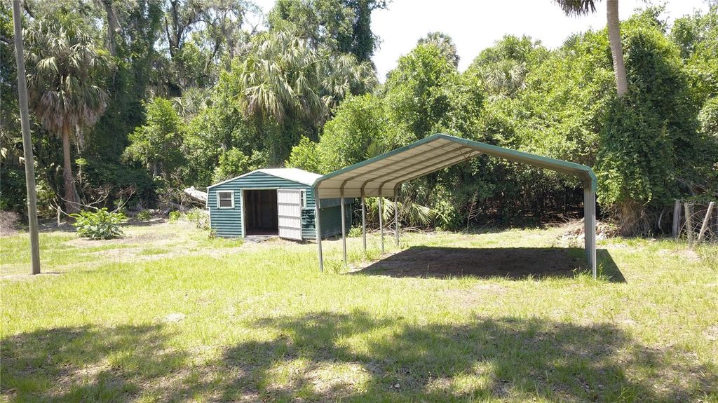 Photo of 11291 SE 202nd Lane, Inglis, FL 34449 (MLS # TB8508389)