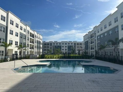 Photo of 1210 Southstation Place #202, Orlando, FL 32809 (MLS # TB8332561)