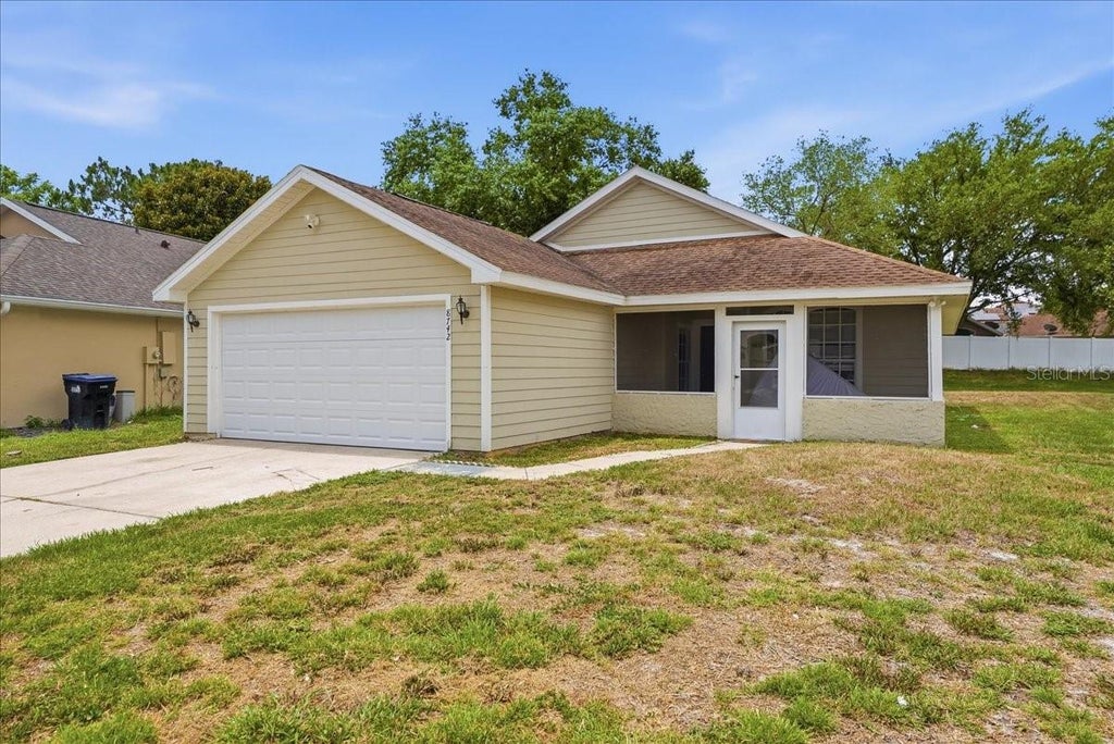 Photo of 8742 Fort Shea Ave, Orlando, FL 32822 (MLS # O6416172)