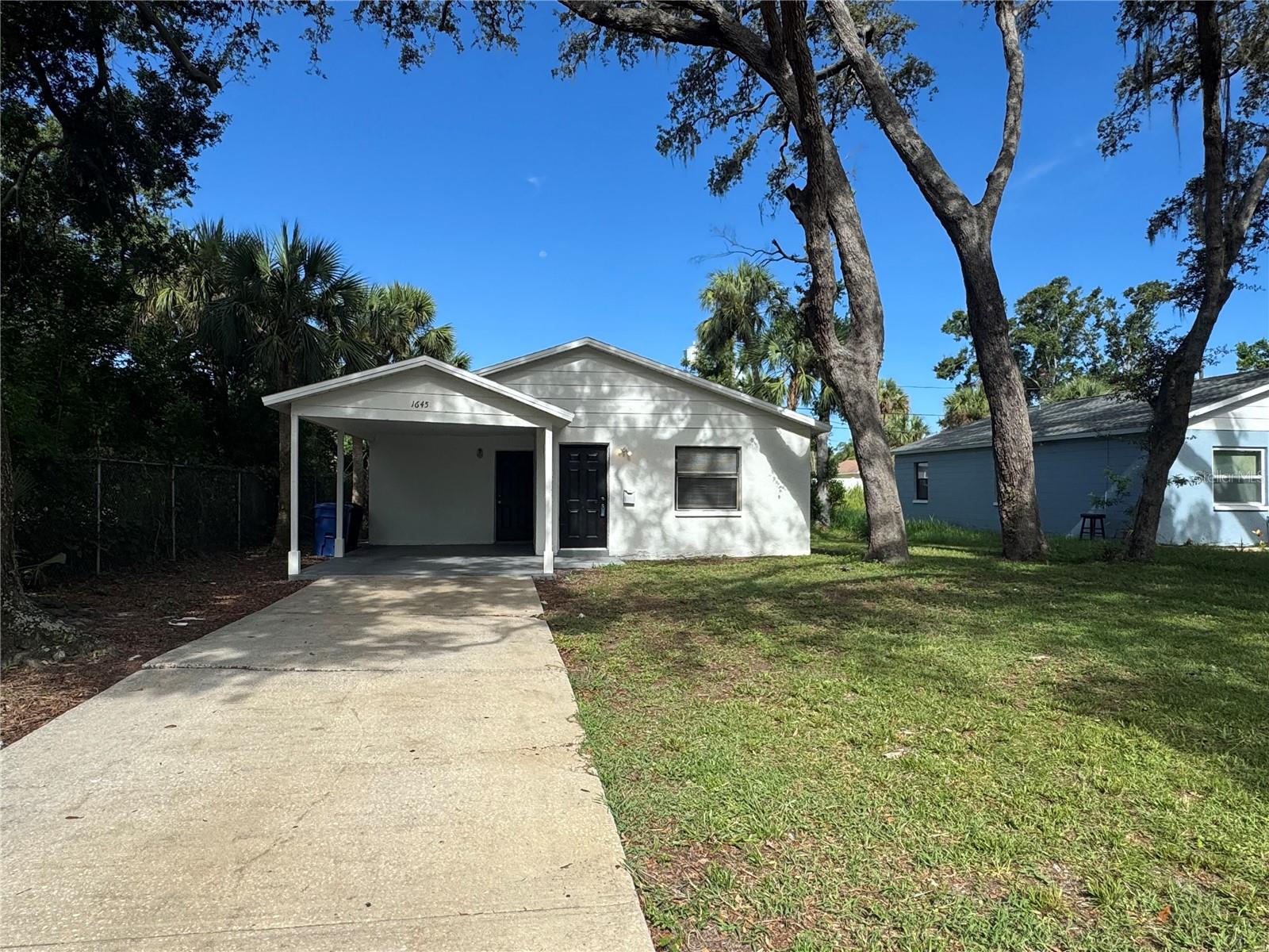 Welcome to this beautiful 3-bedroom, 2-full bath ranch-style home located in the heart of St. Petersburg! Perfectly blending comfort and convenience, this home offers a spacious layout ideal for both relaxing and entertaining. Enjoy the ease of off-street parking, a covered carport, new exterior paint, and a large backyard - perfect for pets, play, or outdoor gatherings. Inside, you’ll find stainless steel appliances, a full-size stackable washer and dryer, and plenty of storage throughout. The generous primary suite features a sizable walk-in closet, while the other two bedrooms offer flexibility for family, guests, or a home office. With quick access to I-275, commuting and getting around the Tampa Bay area is a breeze. Don’t miss out on this move-in-ready gem in a convenient St. Pete location. Schedule your private showing today!