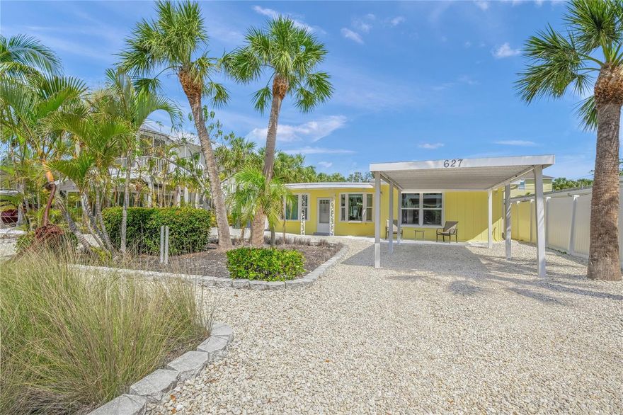 Siesta Key Gem that's Move In Ready! Canal front with NEW composite dock on the Grand Canal. Large swimming pool with cage with comfortable and extensive outdoor living. Three Bedrooms and Four FULL Bathrooms has room for the whole family with multiple entertaining and lounging areas. No expense was spared on renovating this concrete block Florida bungalow. The composite dock new in 2024, roof in 2020, pool and screened pool cage, fencing, and the shed on it's own concrete slab are only a few things that will make this your perfect Florida Dream Home. Tile flooring and hurricane impact windows and doors make this turnkey home perfect for primary residence, vacation/2nd home or investment property. Quartz countertops and bay window sills, new appliances, fixtures & generous closets. Electric panels replaced 2013. This unique Florida home is walking distance to Siesta Village. Siesta Village is know for it's restaurants, nightlife, and shops. Siesta Beach is world renown for it's sugar sand! Exceptional opportunity to live in Paradise!