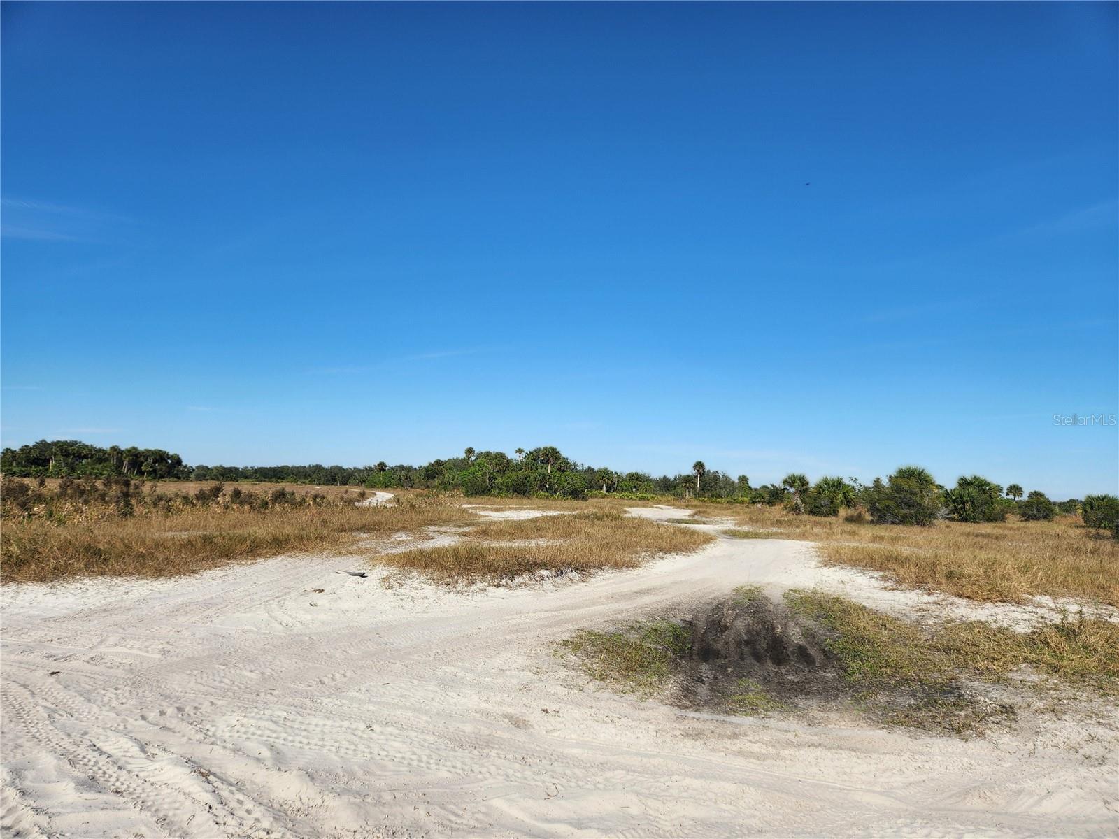 Discover 3 acres in NW Okeechobee County, just minutes from Kissimmee Prairie State Park. it’s perfect for agriculture, weekend getaways, camping, or farming. Enjoy the peace and quiet of the countryside while making a smart investment, as property values continue to rise. Minutes to KISSIMME PRAIRE STATE PARK. Don’t miss your chance to own a slice of Florida’s natural beauty—act now before it’s gone!