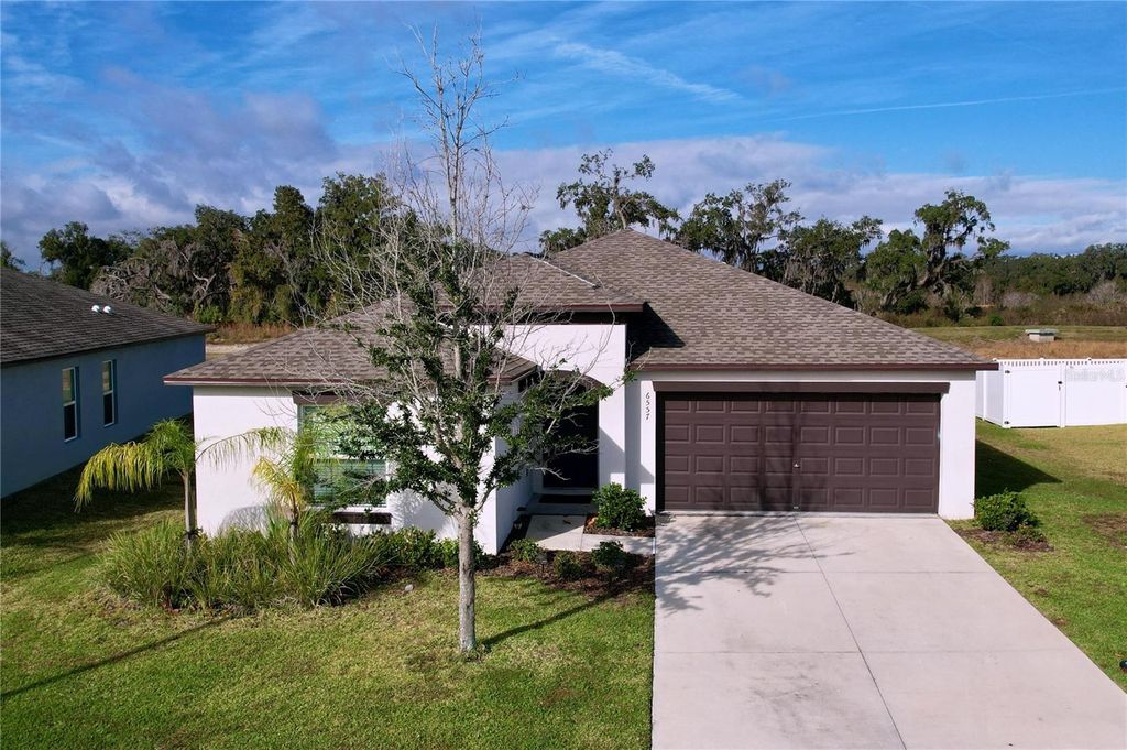 Photo of 6557 Bar S Bar Trail, Zephyrhills, FL 33541 (MLS # TB8454004)