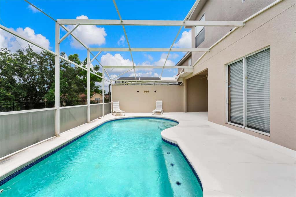 Photo of 516 Brunello Drive, Davenport, FL 33897 (MLS # O6431595)