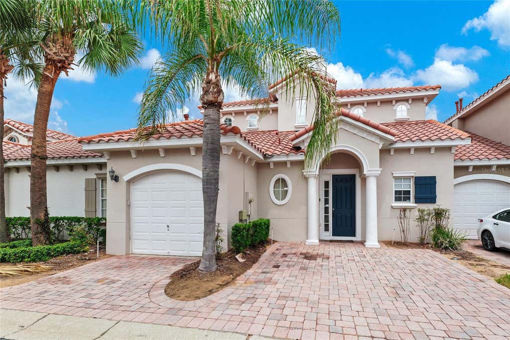 Photo of 516 Brunello Drive, Davenport, FL 33897 (MLS # O6431595)