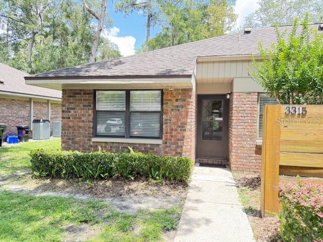 Timberway II boasts one of Gainesville's lowest HOA fee at just $178 a month. This end unit is maintenance free living. This stylish and sun-filled unit features vaulted ceilings and luxury vinyl plank flooring throughout. The kitchen is outfitted with a full suite of appliances including a washer, dryer, brand-new dishwasher and disposal. The new HVAC system was completed replaced in 2023 offering comfort and efficiency year round with a wi-fi thermostat. The spacious primary suite features a generous walk-in closet. Both full baths have freshly updated vanities. Additional highlights include a separate interior laundry room, ceiling fans in every room, a private screened porch and an oversized exterior storage room. There are two assigned parking spaces and beautifully maintained green space perfect for dog walks. This move-in ready home offers effortless, low-maintenance living in a quiet sought after community.