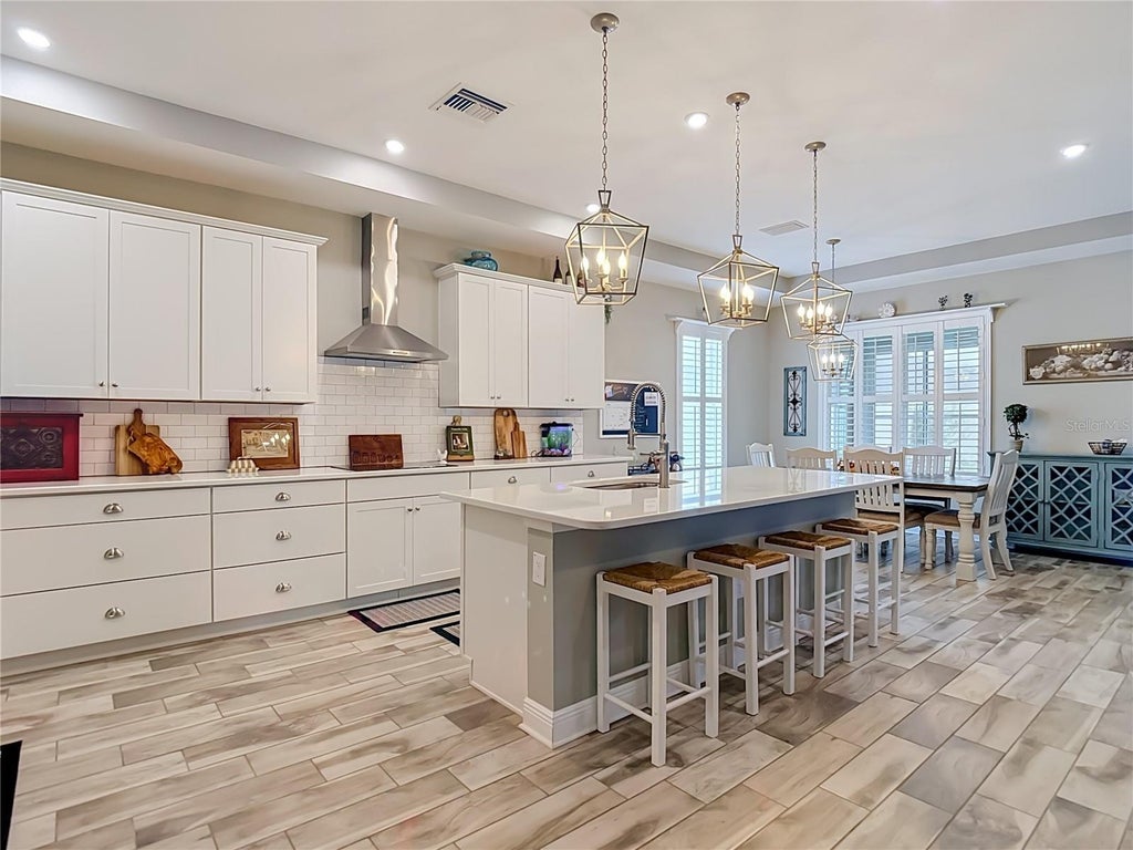 Photo of 813 Old Windsor Way, Spring Hill, FL 34609 (MLS # TB8552446)