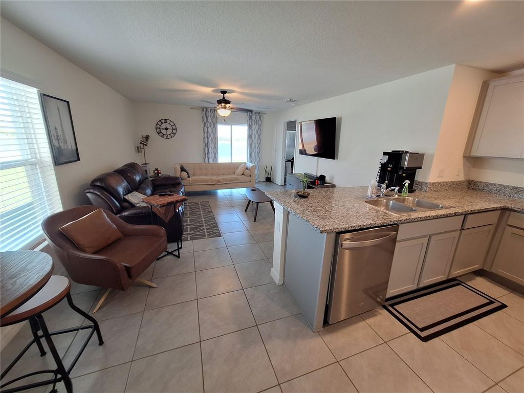 Photo of 511 Sunlit Coral Street, Ruskin, FL 33570 (MLS # TB8483777)