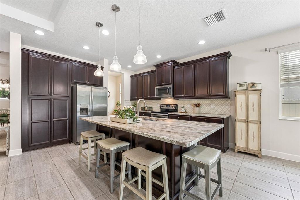 Photo of 1237 Windy Bay Shoal, Tarpon Springs, FL 34689 (MLS # TB8493478)