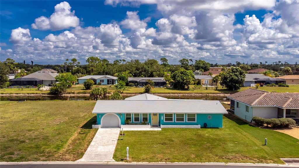 Photo of 219 Caddy Road, Rotonda West, FL 33947 (MLS # D6147834)