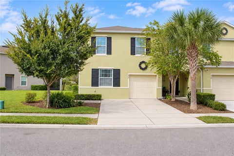 Photo of 424 Arbor Lakes Dr, Davenport, FL 33896 (MLS # O6447175)