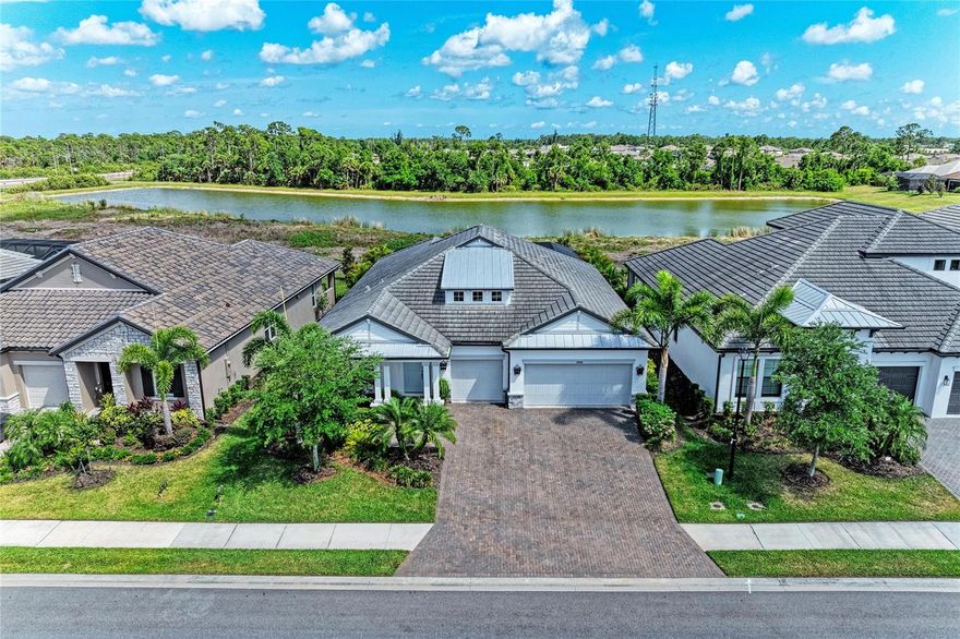 Welcome to this meticulously maintained home located in the highly desirable Oasis at WELLEN PARK. Built by MI HOMES, this sought-after Crystal floor plan offers 3 bedrooms PLUS FLEX ROOM, 3 bathrooms, and a thoughtfully designed layout filled with CUSTOM UPGRADES throughout.
Step inside to discover elegant finishes including TRAY CEILINGS, upgraded LIGHT FIXTURES throughout the home, and detailed TRIM WORK featured in both the main living areas and the primary suite. The CHEF'S KITCHEN is a standout, complete with a beautifully upgraded GLAZED PANTRY DOOR, NEW COOKTOP WITH TOUCHSCREEN and recently REFACED cabinetry, creating both style and function.
This home continues to impress with custom WOOD SHELVING in bedroom closets, PLANTATION SHUTTERS, and a 4 STAGE WHOLE-HOUSE WATER FILTRATION SYSTEM. The laundry room is beautifully upgraded with CUSTOM CABINETRY AND WASH SINK.  The lanai offers custom LIGHTING and was RE-SCREENED in 2024, offering a seamless indoor-outdoor living experience overlooking a serene LAKE VIEW, complemented by LUSH LANDSCAPING that provides added PRIVACY.
Enjoy your private outdoor retreat featuring a SALTWATER LAP POOL WITH NEW LIGHTING AND a NEWER HEATER—perfect for year-round enjoyment. Additional upgrades include RESEALED PAVERS in both the front and rear of the home, a garage with EPOXY FLOORING and CUSTOM CABINETRY, INSULATION added in the garage WITH CEILING FANS and INSULATION in attic, and an ELECTRICAL OUTLET INSTALLED IN GARAGE FOR GENERATOR hookup for peace of mind WITH GENERATOR INCLUDED. The front door has also been recently REPAINTED, adding to the home’s polished curb appeal.  Home also includes SIMPLISAFE HOME SECURITY SYSTEM.
Ideally located in Wellen Park, this home places you just minutes from dining, shopping, the Atlanta Braves stadium, and beautiful Gulf Coast beaches.
This is Florida living at its finest—schedule your private showing today.