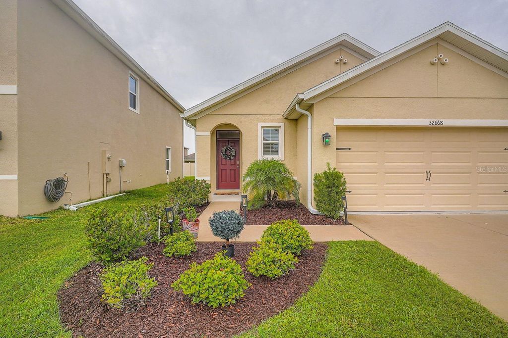 Photo of 32668 Abby Lax Lane, Wesley Chapel, FL 33543 (MLS # L4958333)