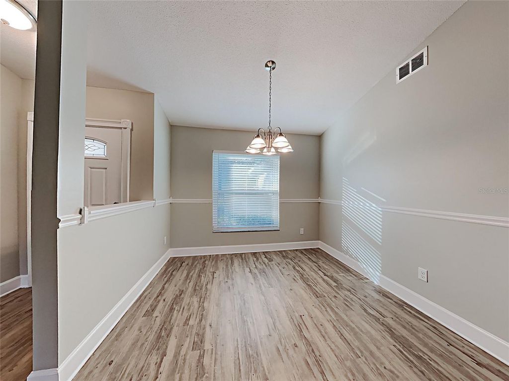 Photo of 10628 Crescendo Loop, Clermont, FL 34711 (MLS # TB8513259)