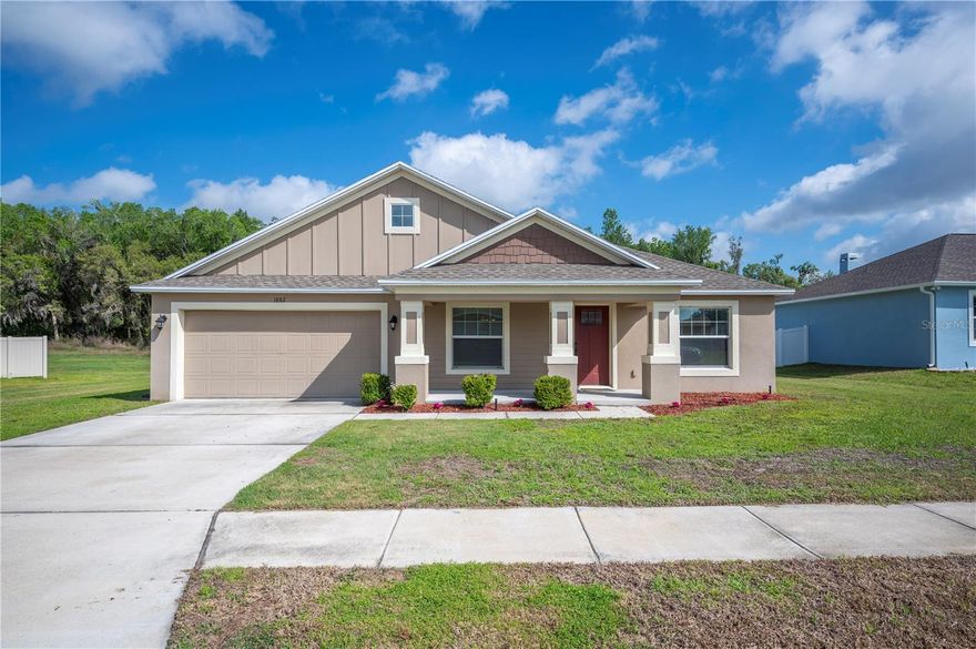 Welcome to this beautifully maintained 3-bedroom, 2-bath home built in 2020 by Southern Homes, located in the heart of Lakeland. Nestled inside a quiet, gated community, this home offers the perfect blend of modern design and everyday comfort. Step inside to a bright, open-concept layout featuring a spacious kitchen that flows seamlessly into the living and dining areas—ideal for both entertaining and daily living. High ceilings throughout create an airy feel, while the thoughtfully designed split floor plan provides privacy between the primary suite and guest bedrooms. The primary bedroom is a true retreat, complete with elegant tray ceilings and a relaxing atmosphere. Whether you’re unwinding after a long day or hosting friends and family, this home offers the space and functionality to fit your lifestyle. Enjoy peace of mind and a sense of community in this well-kept, gated neighborhood—all while being conveniently located near shopping, dining, and major roadways.