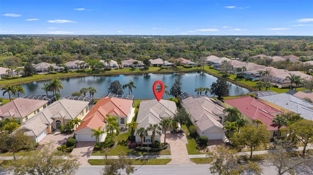 Photo of 7687 Uliva Way, Sarasota, FL 34238 (MLS # A4689543)