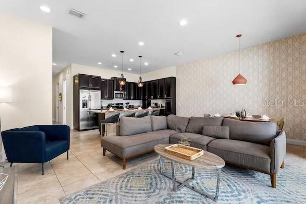 Photo of 305 Captiva Drive, Davenport, FL 33896 (MLS # S5140086)