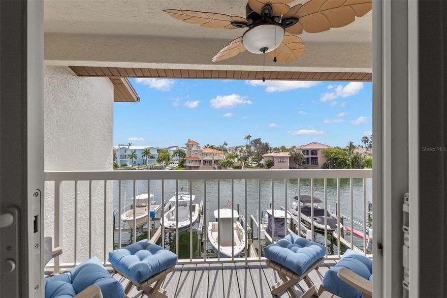 DID YOU SAY $725,000 IN PALMS OF TIERRA? AMAZING ISLAND LIVING! 3 BEDROOM, 3 BATH 1585 SF TOWNHOME WITH DEEDED BOAT SLIP & 10,000 LB BOAT LIFT! BEAUTFUL WATER VIEWS FROM YOUR LIVING ROOM, DINING ROOM, KITCHEN & PRIMARY BEDROOM. 2 BALCONIES WITH TREX FLOORING! THIS OPEN LAYOUT, SPACIOUS COASTAL TOWNHOME WITH LAMINATE FLOORING & CERAMIC TILE MAKES YOU WANT TO MOVE RIGHT IN! STUNNING, SPACIOUS OPEN LIVING ROOM WITH HIGH CEILINGS & PERFECTLY PLACED MODERN FIREPLACE IS SO INVITING! YOU WILL LOVE THE KITCHEN WHERE YOU CAN VIEW BOATS GOING BY WHILE YOU ARE COOKING! BEAUTIFUL WHITE CABINETS, STAINLESS STEEL APPLIANCE PACKAGE & GRANITE COUNTERTOPS ARE READY FOR YOU TO PREPARE PERFECT MEALS. THE INDOOR LAUNDRY IS CONVENIENTLY LOCATED RIGHT OFF THE KITCHEN. YOU CAN ENTERTAIN & ENJOY TALKING WITH YOUR GUESTS IN A DINING ROOM SPACIOUS ENOUGH TO SEAT AT LEAST 8 PEOPLE! THE WHOLE AREA FEELS WARM & INVITING. THE FIRST ON-SUITE BEDROOM IS SPACIOUS ENOUGH FOR A KING BED WITH LOTS OF LIGHT COMING IN & 2 CLOSETS FOR EXTRA STORAGE. 2ND ON SUITE BEDROOM WITH BATH & SHOWER IS GREAT FOR GUESTS OR FAMILY WITH 2 CLOSETS & LOTS OF LIGHT. THE PRIMARY ON-SUITE IS A WONDERFUL BEDROOM THAT HAS SLIDERS WITH AMAZING VIEWS & A RELAXING AREA TO ENJOY YOUR DAYS & EVENINGS! THERE ARE 2 ALWAYS NEEDED PRIMARY CLOSETS WITH EXTRA STORAGE. THE LAYOUT IS WONDERFUL WITH A DOUBLE VANITY & DRESSING AREA OUTSIDE THE BATHROOM. THE PRIMARY BATH HAS A GLASS SHOWER & ROOM FOR EXTRA FURNISHINGS. ALL OF THIS WITH TWO PARKING SPACES OUTSIDE & AN AMAZING TANDEM 3 CAR GARAGE. PLENTY OF STORAGE! THE BACK DOOR LEADS TO YOUR PRIVATE PATIO & WALK OUT TO YOUR BOAT SLIP / LIFT!  THIS LOCATION IS WONDERFUL, CLOSE TO EVERYTHING INCLUDING RESTAURANTS, SHOPPING, WINE BARS, BIKE RIDING, FORT DESOTO BEACH, ST PETE BEACH & 10 MINUTES TO DOWNTOWN ST PETE! CALL TODAY, AT THIS PRICE IT WILL BE SOLD BEFORE YOU BLINK!