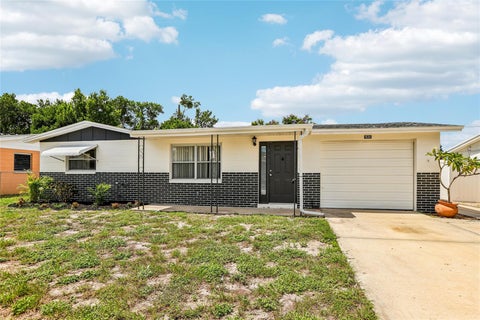 Photo of 1535 Sentinel Street, Holiday, FL 34690 (MLS # TB8546934)