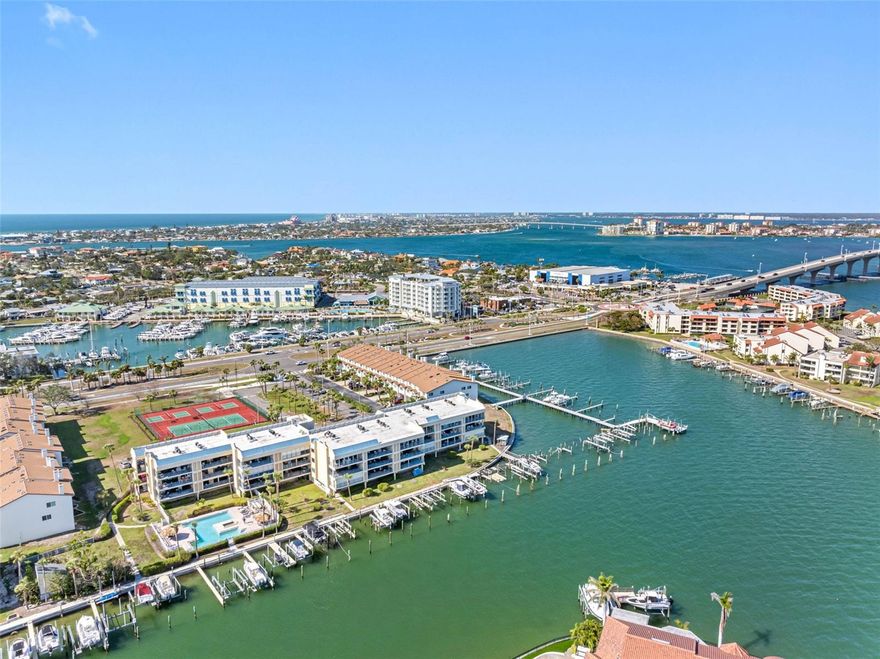 BOAT SLIP & DOCK, WATERFRONT, SINGLE-LEVEL CONDO IN TIERRA VERDE — GORGEOUS WATER VIEWS, HURRICANE SHUTTERS, GENEROUS PET POLICY, RESORT AMENITIES, AND UNDER-BUILDING PARKING

Need a place to keep your boat? This beautifully maintained WATERFRONT condo in the sought-after Anchor Cove community includes a DEEDED wet slip and dock (Slip #45) just steps from your door. Enjoy boating, paddleboarding, or simply watching dolphins and manatees from your oversized balcony overlooking wide canal views and multi-million-dollar homes.

The light-filled, single-level floor plan features an open living/dining area with sliding glass doors that frame the water views. The updated kitchen offers granite countertops, a breakfast bar, built-in desk, ample cabinetry, and in-unit washer/dryer hook-up. The spacious primary suite includes peaceful water views, room for a king bed and seating area, and an ensuite bath with dual sinks and classic white tile. The second bedroom, with access to a full hall bath, works well for guests or a home office.

Step outside to the expansive balcony spanning the full width of the condo—perfect for entertaining or relaxing at the water’s edge. Additional highlights include a storage closet, hurricane shutters, and tandem under-building parking for two cars with space for a dock box.

Anchor Cove offers resort-style amenities: a large waterfront pool and hot tub, resurfaced tennis and pickleball courts, elevator access, and generous guest parking. The pet-friendly policy makes it easy to bring your furry companions.

Located in the heart of Tierra Verde, just across the Bayway from Island Grille and the Marriott rooftop bar, and less than a mile to the town square with shops and restaurants. Outdoor lovers will appreciate nearby Ft. De Soto Park with its beaches, kayaking, dog park, and trails. St. Pete Beach, Pass-a-Grille, downtown St. Pete, and two international airports are all minutes away.

DEEDED BOAT SLIP. WATERFRONT VIEWS. PRIME TIERRA VERDE LOCATION. Don’t miss this opportunity to live the island lifestyle for under $600K.        Video Tour,  https://youtu.be/yHgDGRzHDzs
