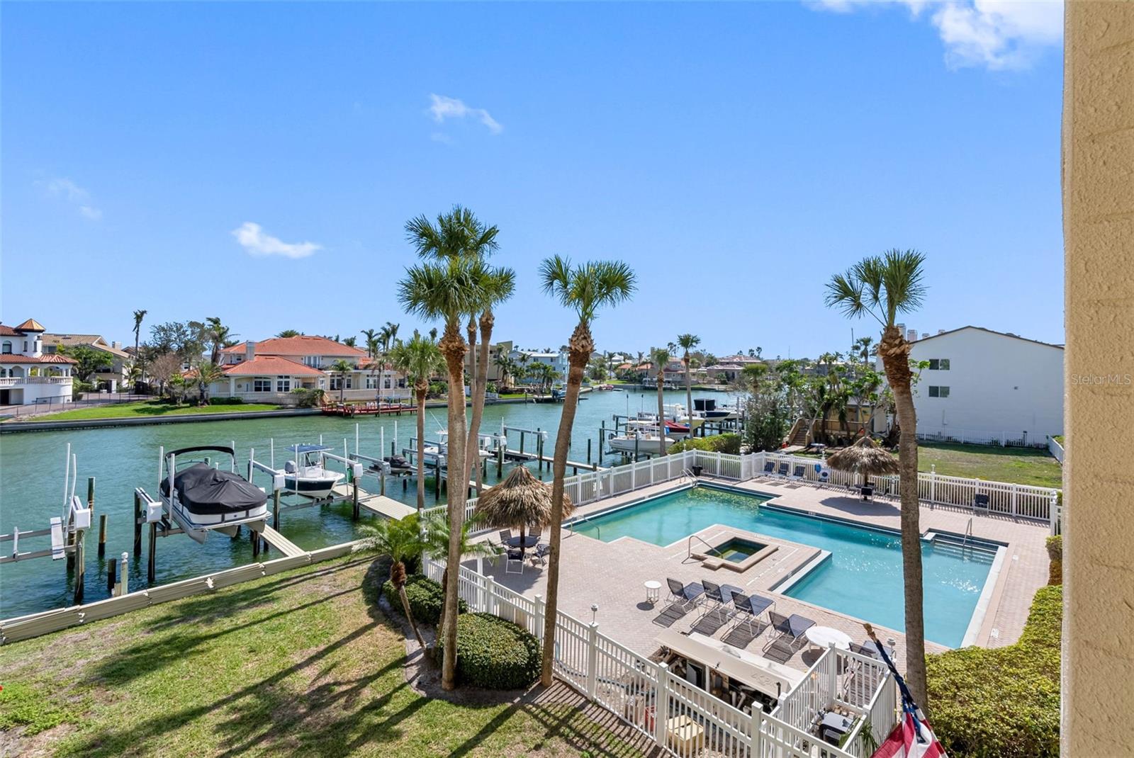 WATERFRONT, SINGLE-LEVEL CONDO IN TIERRA VERDE — GORGEOUS WATER VIEWS, DEEDED BOAT SLIP & DOCK, HURRICANE SHUTTERS, GENEROUS PET POLICY, HUGE POOL & HOT TUB, TENNIS COURTS, UNDER-BUILDING PARKING, ELEVATOR, AND SO MUCH MORE.
Need a place to keep your boat? Welcome to your next adventure! This light-filled WATERFRONT condo in the sought-after Anchor Cove community includes your very own DEEDED wet SLIP AND DOCK (Slip #45)—just steps from your door. Whether you're an avid boater, paddleboarder, or simply love watching dolphins and manatees swim by, this is Florida living at its finest.
Inside, the single-level floor plan offers a bright and open layout that seamlessly blends the living, dining, and kitchen areas—perfect for entertaining or relaxing after a day on the water. Expansive sliding glass doors flood the space with sunlight and frame panoramic canal views overlooking multi-million-dollar homes.
The stylish kitchen features granite countertops, a breakfast bar, built-in desk, ample cabinetry, and in-unit washer/dryer hook-up for convenience. The primary suite offers peaceful WATER VIEWS, space for a king bed and seating area, and an ensuite bath with dual sinks and classic white tile. The second bedroom is perfect for guests, a home office, or creative space, with easy access to a second full bath.
The real highlight? An OVERSIZED BALCONY that spans the entire width of the condo. It's your front-row seat to dolphins, manatees, and incredible views and great for entertaining. There’s also a storage closet and tandem under-building parking FOR TWO CARS, with room for a dock box to store your fishing rods and boating gear.
Anchor Cove is a well-maintained, solidly built community featuring resort-style amenities, including:
Huge waterfront pool and hot tub, newly resurfaced tennis and pickleball courts, elevator access, ample guest parking, and storm shutters for added peace of mind. Plus, the generous pet policy makes it easy to bring your furry friends along.
Located just across the Bayway from Island Grille and the Marriott rooftop bar, and less than a mile to Tierra Verde's town square, shops, and restaurants. Outdoor lovers will enjoy the proximity to Ft. De Soto Park, with its nature trails, kayaking, beaches, dog park, and historic fort. And with St. Pete Beach, Pass-a-Grille, and Downtown St. Pete just minutes away—and two international airports within easy reach—you’re never far from anything.
DEEDED BOAT SLIP. WATERFRONT VIEWS. RESORT AMENITIES. PRIME TIERRA VERDE LOCATION. Ready to live the island life? Don’t miss your chance—schedule your private showing today!
??? Video Tour: https://youtu.be/yHgDGRzHDzs