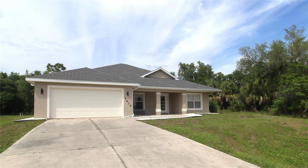 Photo of 1639 Lace Terrace, Port Charlotte, FL 33953 (MLS # A4675628)