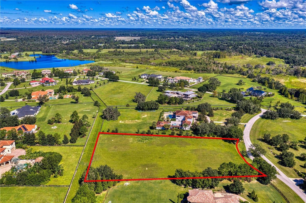 Photo of 10648 Broadland Pass, Thonotosassa, FL 33592 (MLS # TB8558668)
