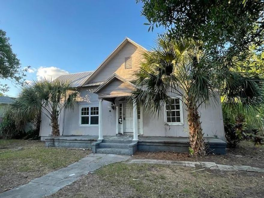 This spacious 3-bedroom 2-bathroom home has a good bones, high ceilings, a fenced yard, spacious rooms, a metal roof, etc.  The property also has a small bonus room that would be great for an office.  Great opportunity for someone looking for a good value in this neighborhood and is willing to do some work and cosmetic updating.  Convenient location, just minutes off of I-275.  Easy commute to downtown, or anywhere in the central Tampa area.