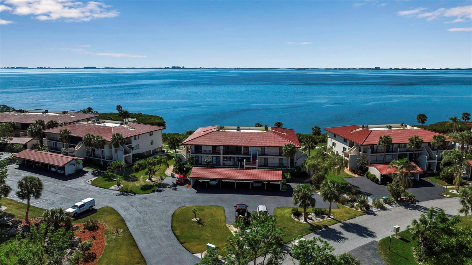 Nothing to do here! Totally updated and ready to move in. 3 bedroom/2 bath with unlimited viewing of Sarasota Bay! Totally remodeled top to bottom everything has been updated. Appliances, lighting, doors, Hurricane windows and sliders, bathrooms, and huge 7 foot kitchen island that is perfect for entertaining and so much more. Snowbirds watch the sunset every night from your panoramic view of Sarasota Bay. Waterfront condo at its finest. New Roof installed 2024. No need for a high-rise structure integrity concern. Make an appointment for your personal showing, pack your bags and move in!!!! Enjoy the American dream right here on Sarasota Bay. Wild Oak Bay community may be the best hidden gem in all of Manatee and Sarasota County. Minutes to the beaches, Arts of Sarasota and Sarasota international airport. IMG acadamy, IMG Golf coarse, BTC Tennis club and so much more!!!