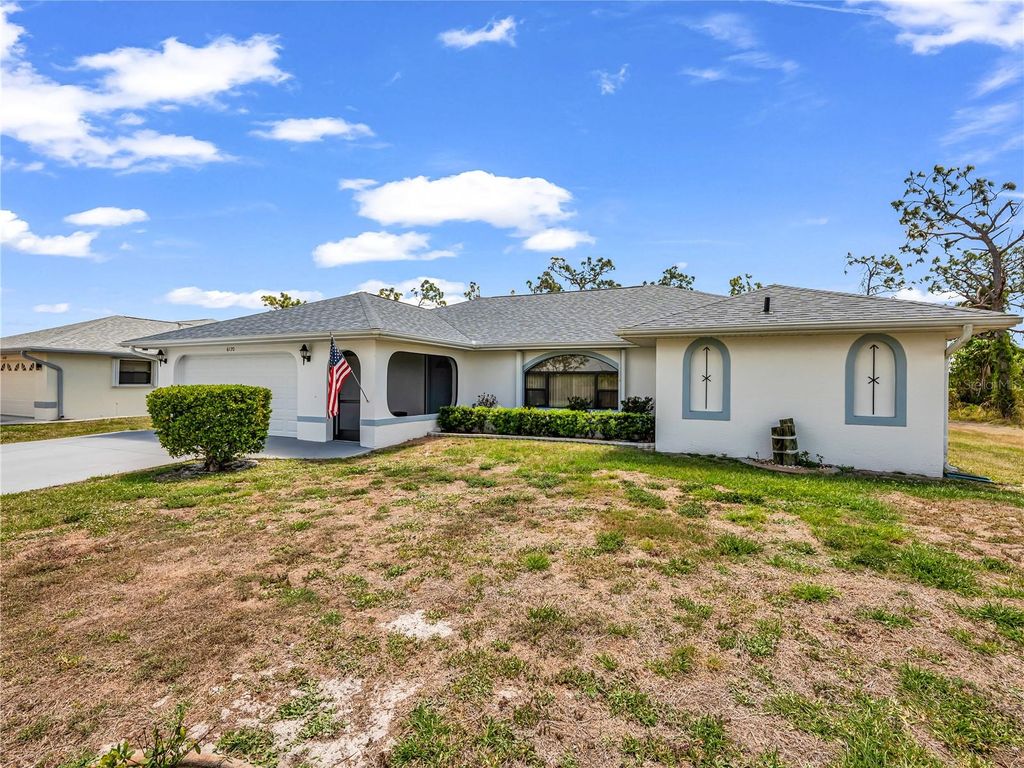 Photo of 6170 David Boulevard, Port Charlotte, FL 33981 (MLS # OM723505)