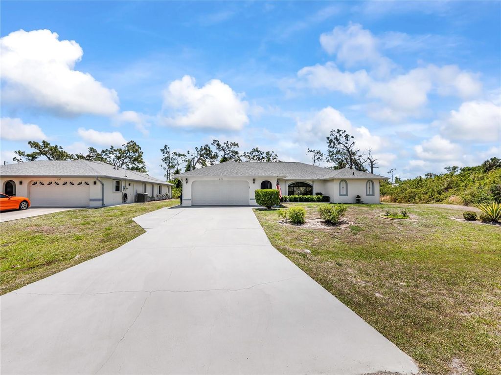 Photo of 6170 David Boulevard, Port Charlotte, FL 33981 (MLS # OM723505)