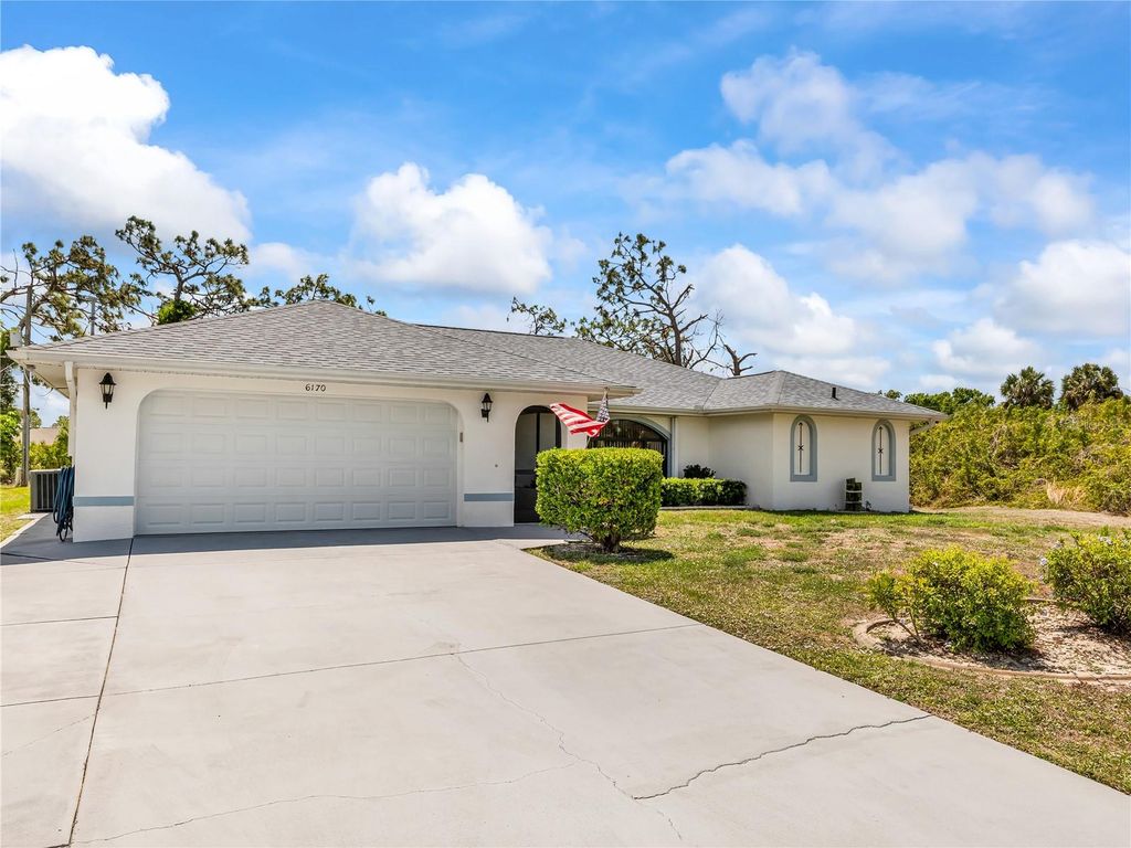 Photo of 6170 David Boulevard, Port Charlotte, FL 33981 (MLS # OM723505)