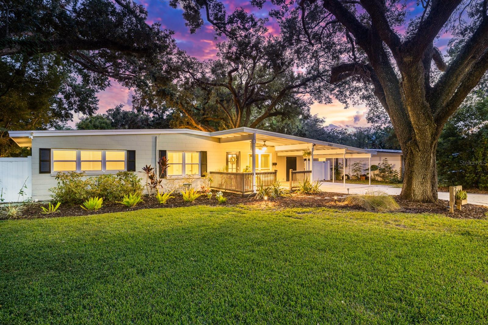 One or more photo(s) has been virtually staged. Don’t miss your opportunity to own a home in one of Orlando’s most sought-after neighborhoods — Colonialtown South. Known for its charming streets, eclectic architecture, and unbeatable location, this vibrant community rarely sees homes hit the market — and when they do, they go fast.
Step inside this 3 bedroom 2 bath home you’ll find COMPLETELY UPDATED bathrooms with quartz countertops (2021), granite counter tops in the kitchen, BRAND NEW windows (2025) NEW exterior doors (2024), BRAND NEW hot water heater (2025),HVAC system (2021), roof (2019) and all freshly painted interior. Each room maintains its cozy, traditional layout, offering a sense of warmth and privacy, while still allowing for an easy, natural flow ideal for everyday living. One of the home’s standout features is the sunlit Florida room, a bright and inviting space surrounded by windows that flood the room with natural light throughout the day. This versatile area offers panoramic views of the oversized backyard and is the perfect spot for movie nights or cheering on your favorite team.
French doors off the kitchen lead you to your oversized back yard with ample space for pets or play structures! The vinyl fence was installed in 2021. The partially covered deck is the perfect entertainment space that invites you to relax with your morning coffee, unwind in the evening, or entertain guests under the dappled shade of mature trees.
This is more than just a property; it’s a chance to be part of a neighborhood rich in history, character, and modern convenience. This rare gem is conveniently located just minutes from downtown Orlando, the Mills 50 District, Lake Eola, Dr. Phillips Performing Arts and Kia Center. Colonialtown South offers the perfect balance of quiet residential living and urban accessibility. Walk or bike to your favorite coffee shops, or local restaurants including a Michelin starred, groceries, and community parks.
With its tree-lined streets, strong sense of community, and a blend of classic bungalows and updated homes, Colonialtown South continues to be a top choice for discerning buyers. This 1955 mid century home stands out as a move-in-ready treasure that honors its history while embracing today’s standards and comforts.