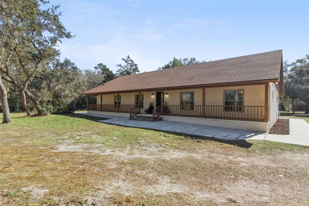 Photo of 721 Riverwoods Trail, Chuluota, FL 32766 (MLS # O6371819)