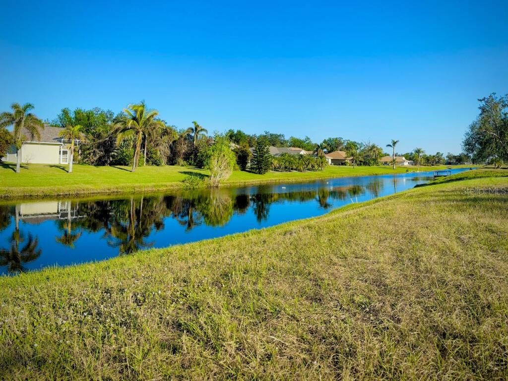 Photo of 683 Rotonda Circle, Rotonda West, FL 33947 (MLS # O6264223)