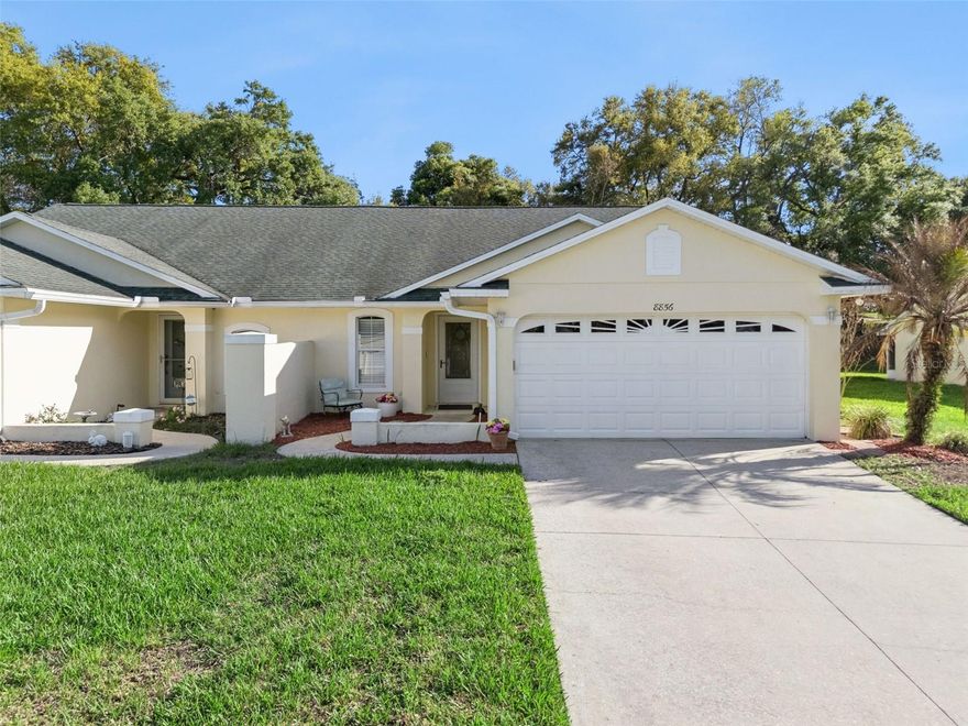 Beautifully updated and move-in ready, this 2-bedroom, 2-bath villa with a spacious loft offers the perfect blend of comfort, style, and low-maintenance living. Featuring 1,436 square feet and a desirable 2-car garage, this home has been thoughtfully upgraded with fresh interior paint (2026) and a newly renovated kitchen showcasing modern cabinetry and stunning quartz countertops (2026). The open layout is enhanced by tile flooring throughout the entire downstairs, creating a clean and cohesive look that’s both stylish and easy to maintain. The versatile loft provides the perfect space for a home office, guest area, or flex room to fit your lifestyle. Enjoy relaxing or entertaining on the large screened lanai, ideal for Florida living year-round. Major updates include a roof (2018), New A/C (2025), hot water heater (2023), garage door opener (2023), new drain field (2023), refrigerator (2025), and garbage disposal (2026), offering peace of mind for years to come. The HOA provides exceptional value by covering roof replacement materials (owner responsible for labor), lawn care, irrigation, and exterior materials—allowing for truly low-maintenance ownership. Residents also enjoy access to community amenities including a sparkling pool, clubhouse with reservable kitchen for private events, and direct access to the popular Rails-to-Trails bike and walking path. Conveniently located near shopping, dining, and everyday essentials, this home is a fantastic opportunity for those seeking an updated villa in a prime location with lifestyle-focused amenities.