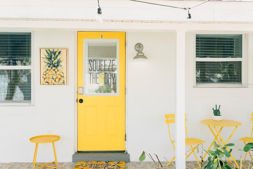 This newly renovated, fully furnished, and fully stocked 1 bedroom/1 bath rental offers a bright, comfortable, and highly convenient living experience in the heart of St. Pete Beach—ideal for travel nurses, remote workers, those relocating, or families needing temporary housing. Available for short-term, mid-term, or long-term stays, the apartment is part of a quadplex where each unit features its own uniquely curated theme, and offers a thoughtfully designed interior with a full kitchen equipped with cookware and essentials, a spacious living area with a sofa and smart TVs, high-speed Wi-Fi for remote work, and a modern bathroom with double rainfall showerheads. Sleeping accommodations include a king bed and a sleeper sofa, all with comfortable memory-foam mattress. A professional commercial laundry service provides fresh linens at move-in and move-out for added convenience. The gated outdoor spaces are shared with other units and include turf, a picnic area with string lighting, and an outdoor shower—creating a relaxed and inviting environment for unwinding outside. The location is exceptional: less than a mile to both Upham Beach and Sunset Beach, and walkable to restaurants, coffee shops, a convenience store, pizza takeout, local bars (including a microbrewery next door), and the St. Pete Beach Community Center with park amenities, pool access, and EV charging stations. Monthly utilities are included, and on-site laundry is available along with a laundromat next door. The property is clean, well maintained, and professionally managed to ensure a comfortable and seamless stay. Outdoor areas are shared, and pets may be considered with approval. This bright, cheerful, lemon unit - lovingly referred to as "Squeeze the Day" - provides a turnkey option for anyone seeking an easy transition into the St. Pete Beach lifestyle with everything needed for a comfortable extended stay.