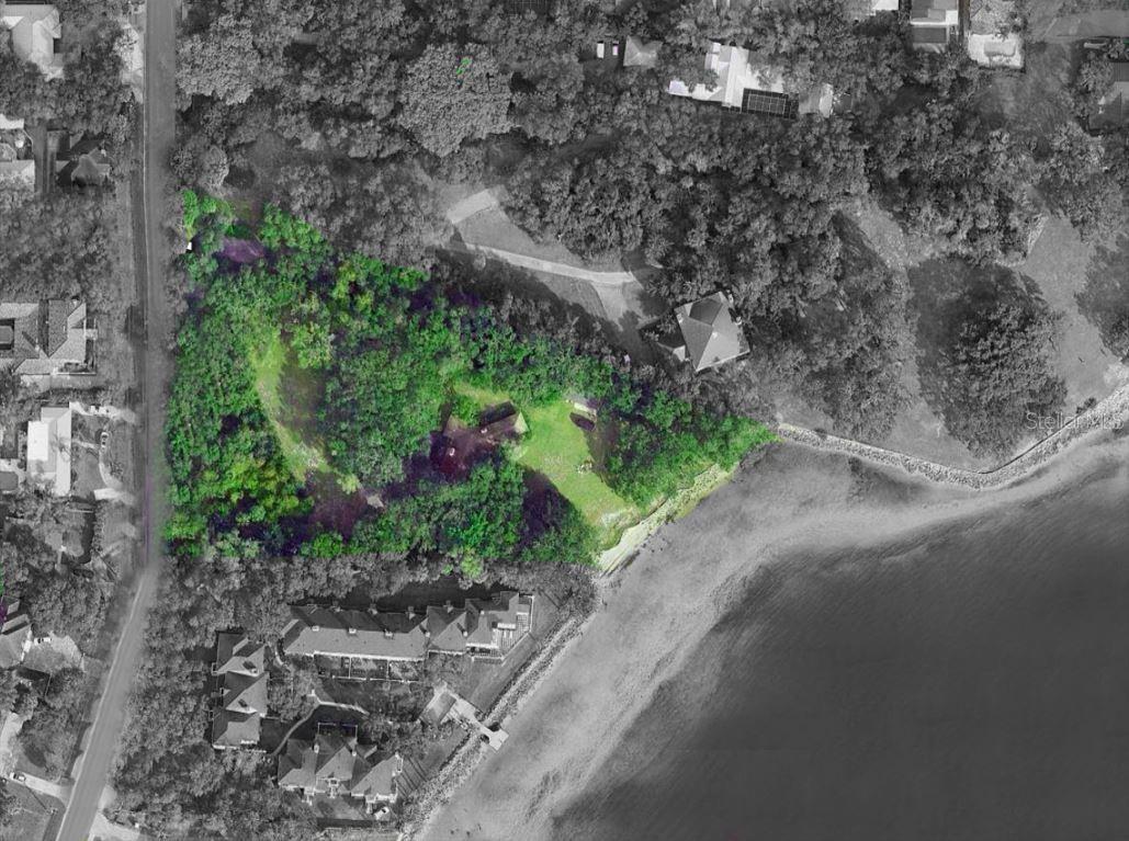 Nestled along the prestigious Bayshore Blvd in South Tampa, this property presents an exceptional and rare opportunity. Spanning an expansive 2.3 acres, this waterfront gem offers a
remarkable 199 feet of open bay frontage, providing breathtaking views of Hillsborough Bay. Boasting a highly sought-after location, this is more than just a property; it's a rare opportunity to
own or develop a piece of South Tampa's prestigious Bayshore Blvd. The scarcity of land of this size in such a prime location enhances the property's appeal. Beyond the potential for
development, residents will enjoy proximity to fine dining, shopping, top-rated beaches, downtown and various amenities. The scenic beauty of Hillsborough Bay is an ever-present backdrop,
enhancing the desirability of this unique parcel. The rarity of such a sizable lot (100, 225sqft) in this coveted area makes this a once-in-a-lifetime chance for prospective homeowners and
developers alike. Dimensions of this property: 281 front x 541 north x 383 south x 199 water, measurements are taken from the boundary survey completed 11/2023. The house is a tear down,
value is in the land. There is an updated mother-in-law/ care takers cottage on the property.
Don't miss the chance to own or develop a piece of South Tampa's waterfront paradise. There is a Caretaker living on this property, please DO NOT walk this property without the presence of the Listing Agent and a confirmed scheduled
showing.