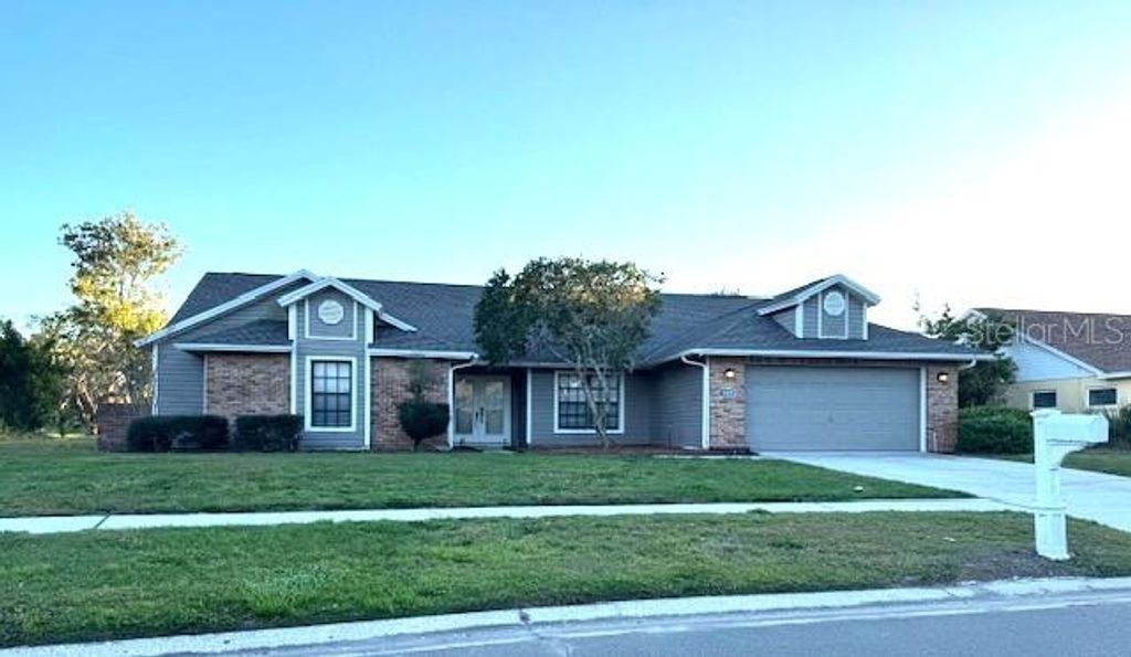 Photo of 1407 Holleman Drive, Valrico, FL 33596 (MLS # TB8456668)