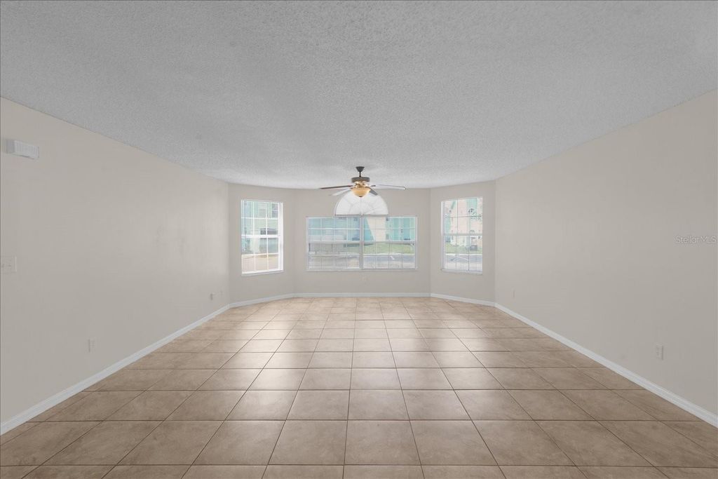 Photo of 2731 N Poinciana Boulevard #107, Kissimmee, FL 34746 (MLS # O6402076)