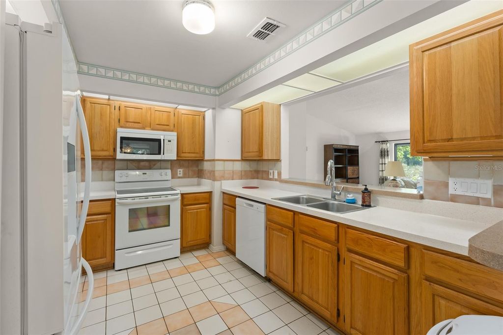 Photo of 9717 Lake Douglas Place, Orlando, FL 32817 (MLS # O6391068)