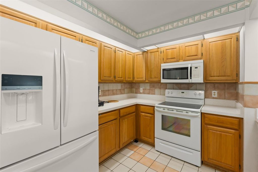 Photo of 9717 Lake Douglas Place, Orlando, FL 32817 (MLS # O6391068)