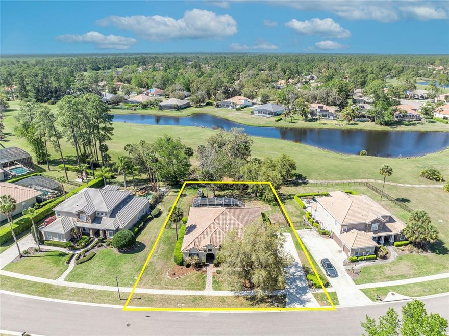 Discover a rare opportunity to own a stunning 5-bedroom, single-story estate in one of Lake Mary’s most exclusive guard-gated communities—Magnolia Plantation.  Situated on a private .41-acre lot, this home offers exceptional tranquility with expansive wooded views and no rear neighbors—only the beautifully manicured grounds of the Mike Bender Golf Academy. This beautifully updated residence blends luxury, comfort, and modern design. The thoughtfully designed open-concept floor plan features soaring ceilings, fresh interior paint, upgraded lighting, and stylish new luxury vinyl flooring throughout. The modern kitchen offers sleek finishes, generous cabinetry, and ample prep space—perfect for both everyday living and entertaining. With five spacious bedrooms and three full bathrooms, the home provides plenty of room for family and guests. The primary suite serves as a private retreat, offering peaceful views of the surrounding natural landscape. Step outside to your own private outdoor oasis, where a screened, heated pool and covered patio create the perfect setting for relaxing or entertaining year-round. Beyond the pool, the expansive backyard features a fire pit and abundant space for play, gatherings, or future outdoor enhancements. Additional highlights include a three-car garage, providing ample room for vehicles, storage, or a workshop and added electrical for an RV. Recent upgrades include:  New tile roof (2023), New A/C (2025), New luxury vinyl flooring, Upgraded electrical, Electric pool heater.  Magnolia Plantation offers more than just a home—it offers a lifestyle, with guard-gated security, top-rated Seminole County schools, and convenient access to Lake Mary’s popular dining and shopping destinations. Commuters will appreciate quick access to I-4, SR-417, and SR-429. If you're searching for modern luxury, ultimate privacy, and a prime Lake Mary location, this exceptional property delivers it all.