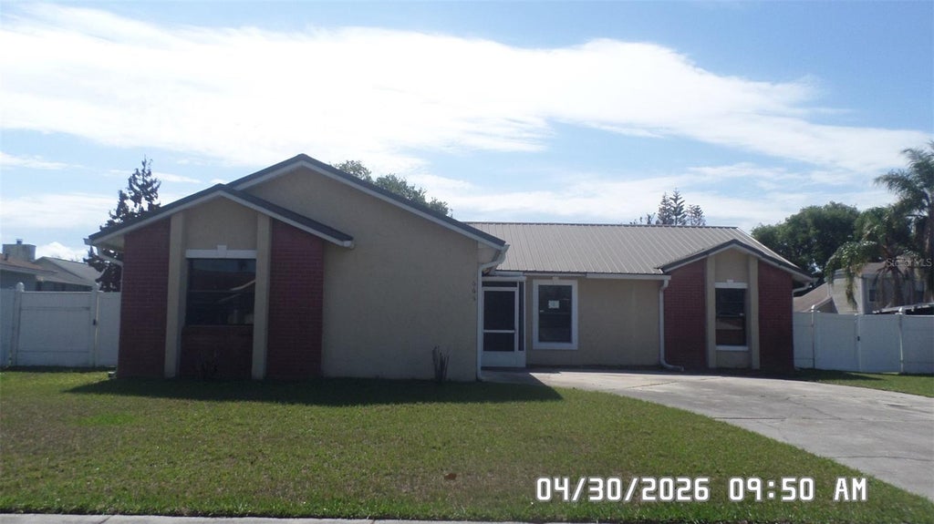Photo of 2665 Mill Run Boulevard, Kissimmee, FL 34744 (MLS # O6404497)