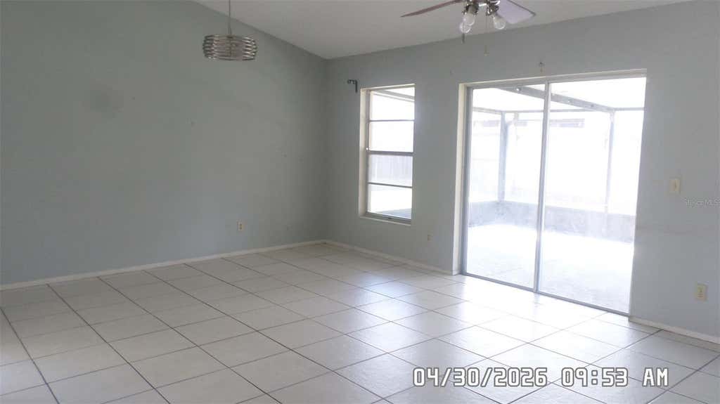 Photo of 2665 Mill Run Boulevard, Kissimmee, FL 34744 (MLS # O6404497)